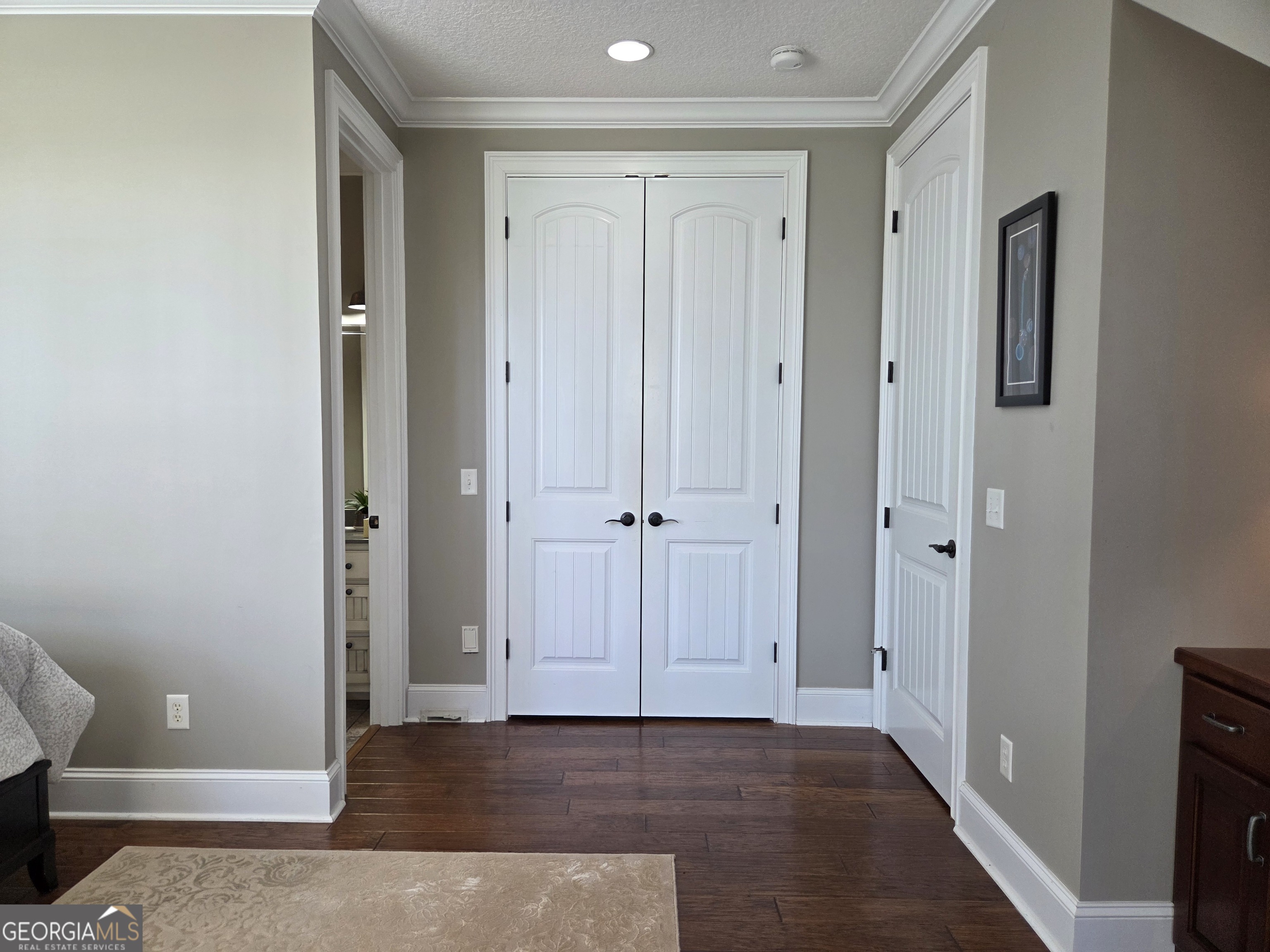 300 Hammond Powell Road Hazlehurst, GA 31539 - Photo 76 of 91 a view of a hallway with wooden floor and closet