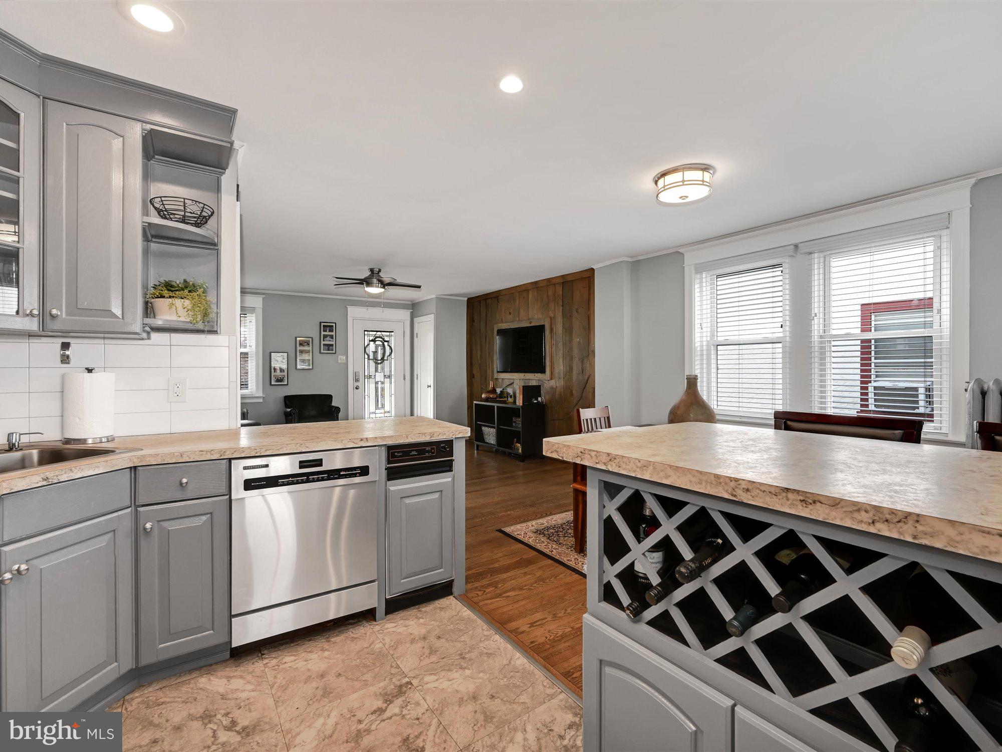 114 Summit Road Media, PA 19063 - Photo 13 of 27 a large kitchen with stainless steel appliances granite countertop a stove and a sink
