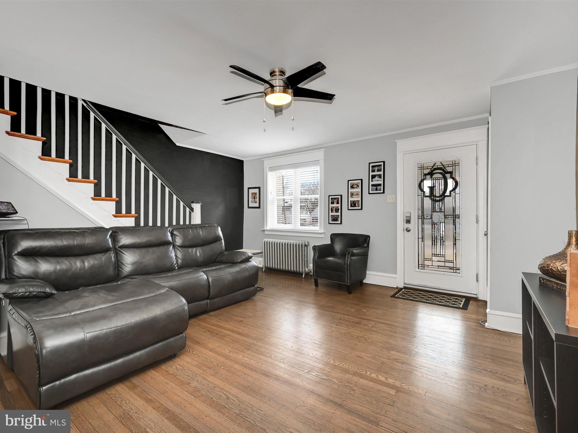 114 Summit Road Media, PA 19063 - Photo 4 of 27 a living room with furniture and a wooden floor