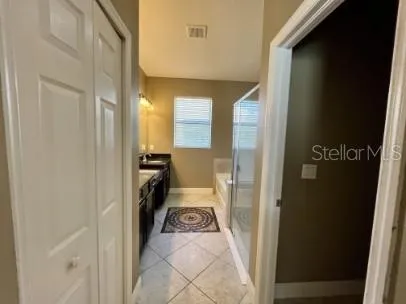 a hallway with a view of bedroom with hallway