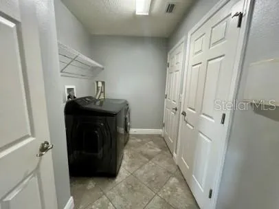 a view of a hallway and a sink