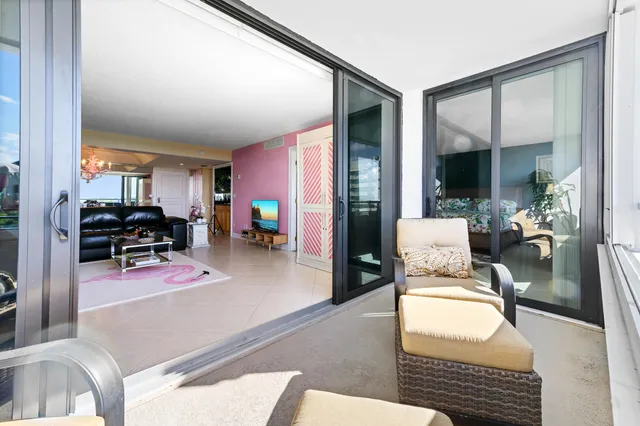 a bedroom with furniture and a gym equipment