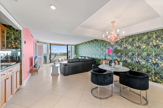 a kitchen with a table and chairs