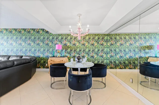 a kitchen with a table and a chairs