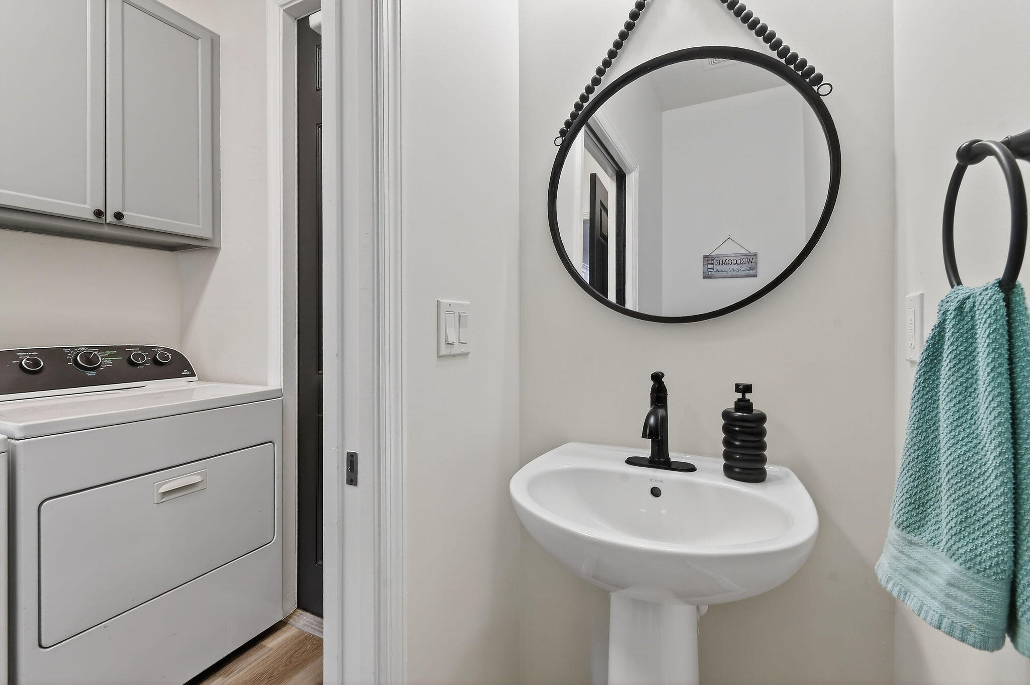 3241 Hemingway Drive Jupiter, FL 33458 - Photo 16 of 39 a bathroom with a sink and a mirror