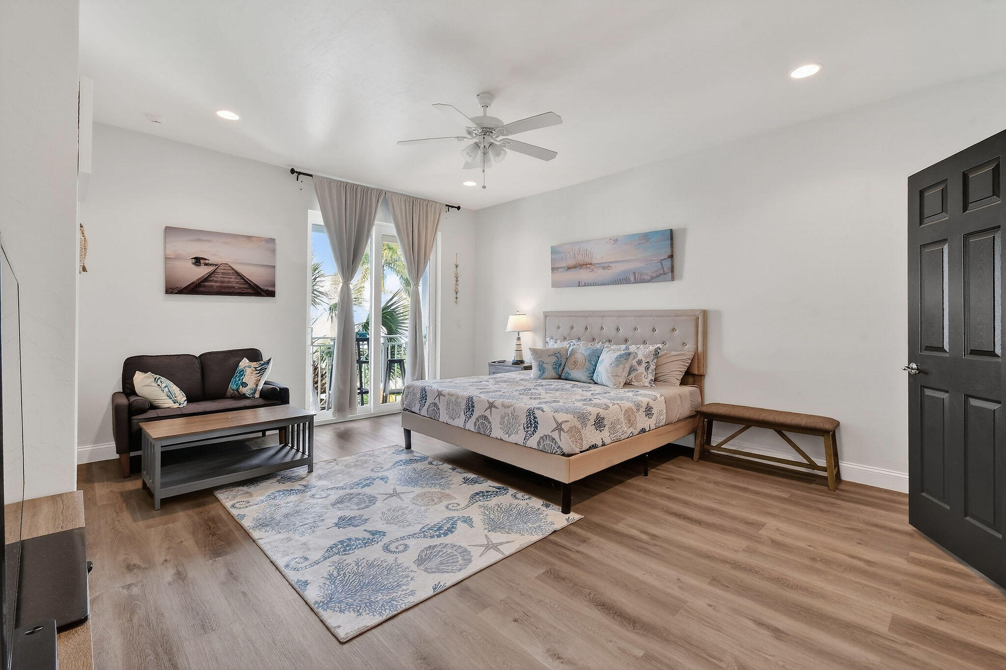 3241 Hemingway Drive Jupiter, FL 33458 - Photo 19 of 39 a bedroom with a bed and a couch