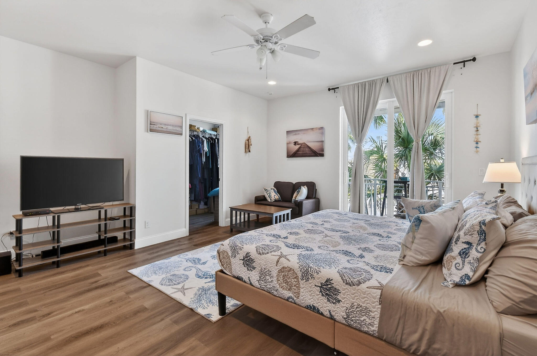 3241 Hemingway Drive Jupiter, FL 33458 - Photo 20 of 39 a bedroom with a bed and a flat screen tv