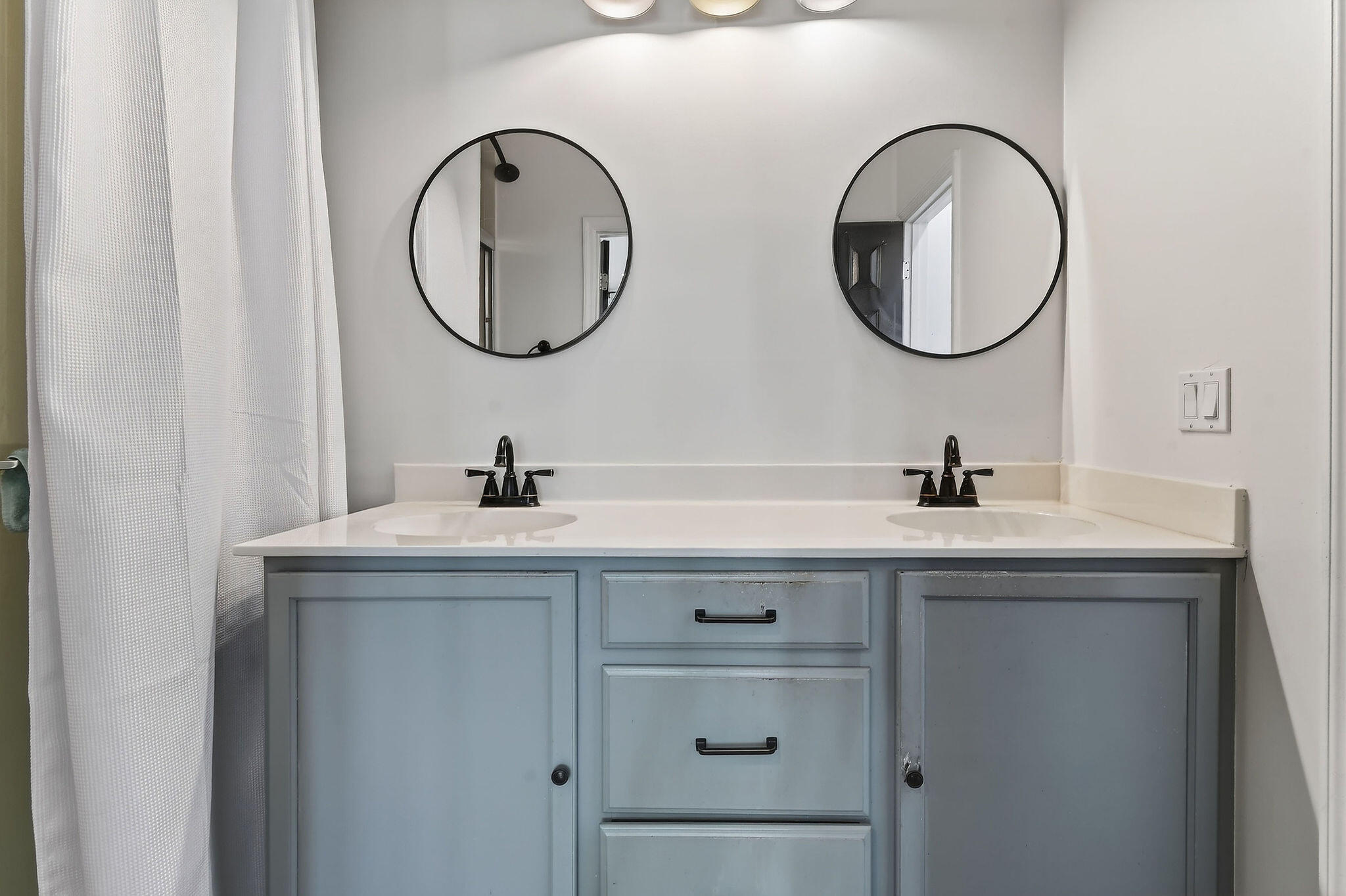 3241 Hemingway Drive Jupiter, FL 33458 - Photo 24 of 39 a bathroom with a granite countertop sink a mirror and a