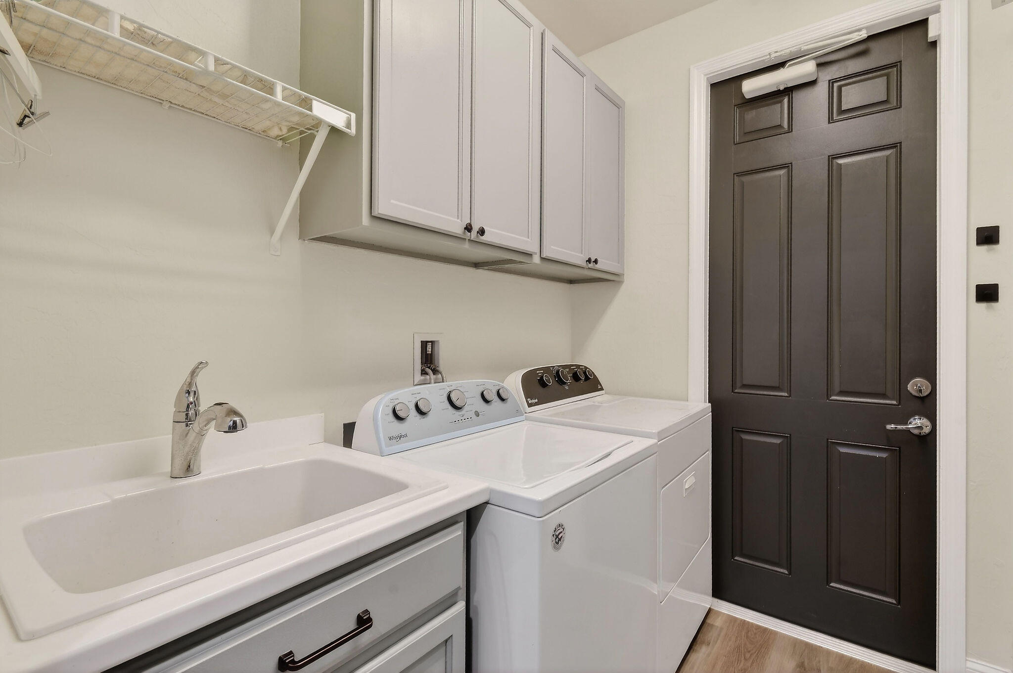 3241 Hemingway Drive Jupiter, FL 33458 - Photo 36 of 39 a utility room with dryer and washer
