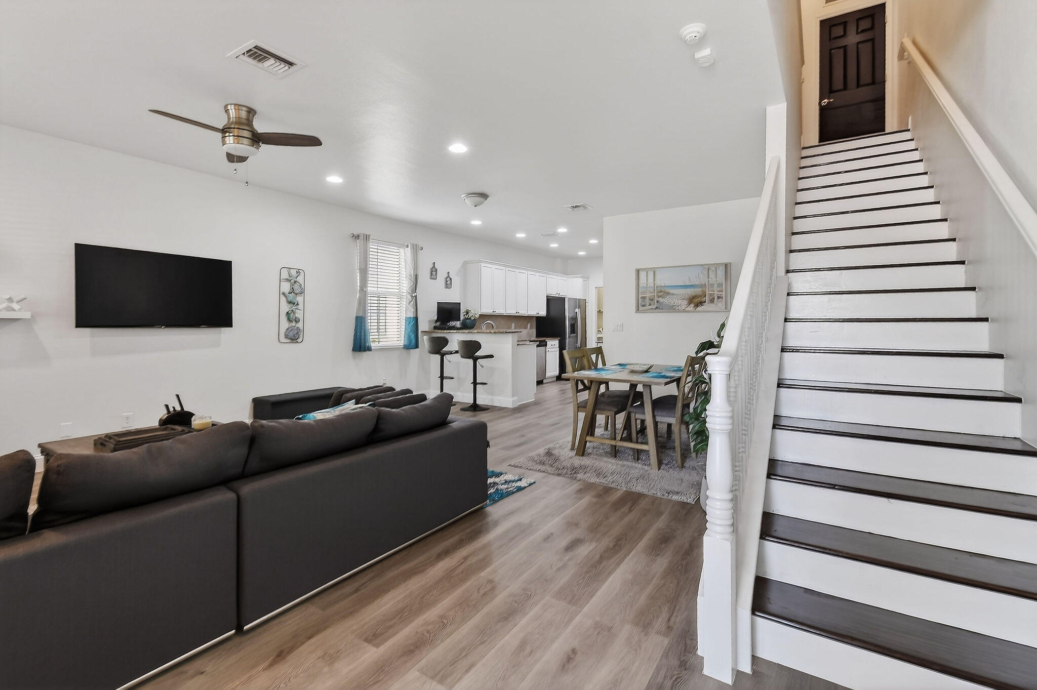 3241 Hemingway Drive Jupiter, FL 33458 - Photo 4 of 39 a living room with furniture and a flat screen tv