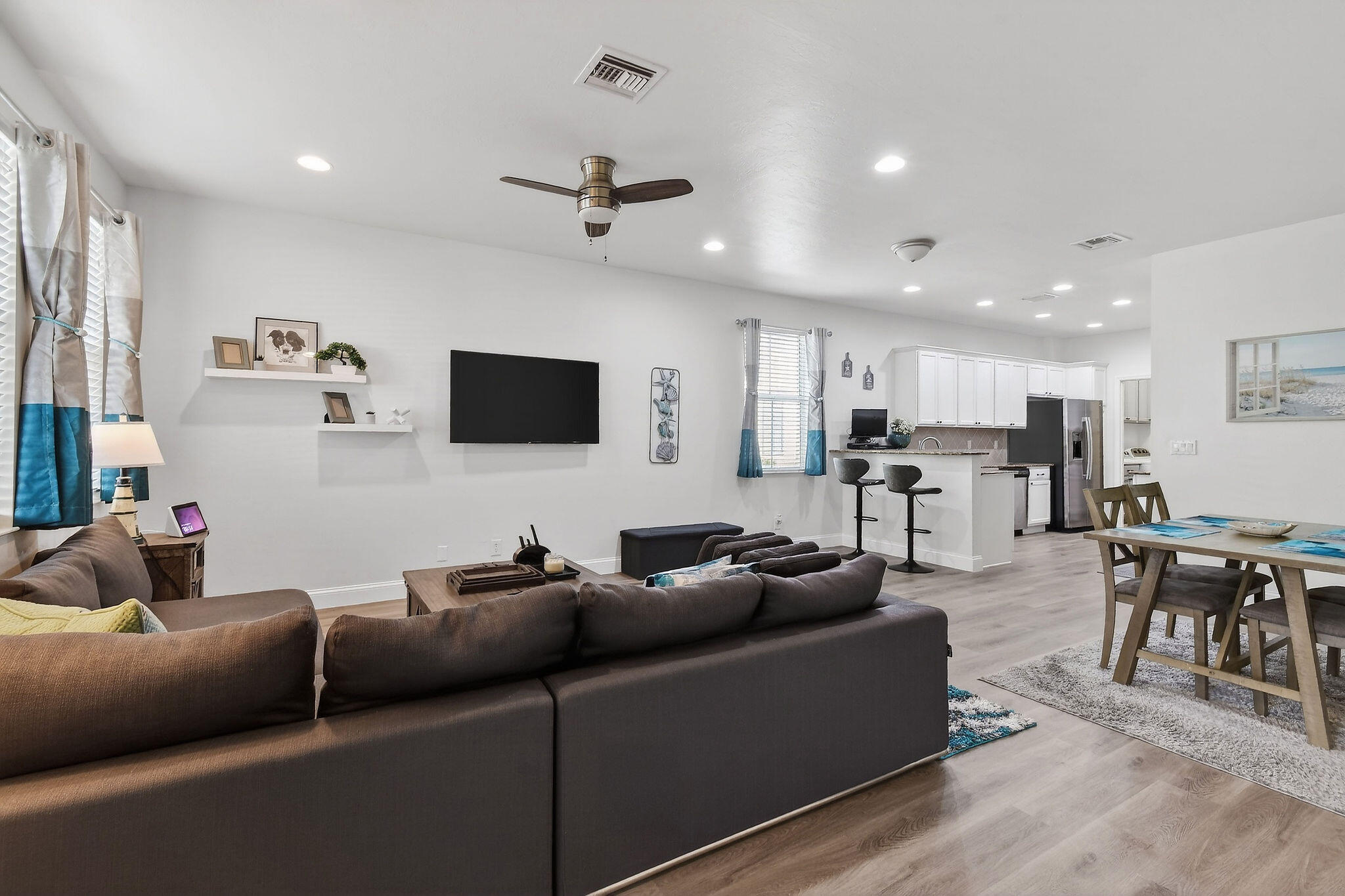 3241 Hemingway Drive Jupiter, FL 33458 - Photo 5 of 39 a living room with furniture and a flat screen tv