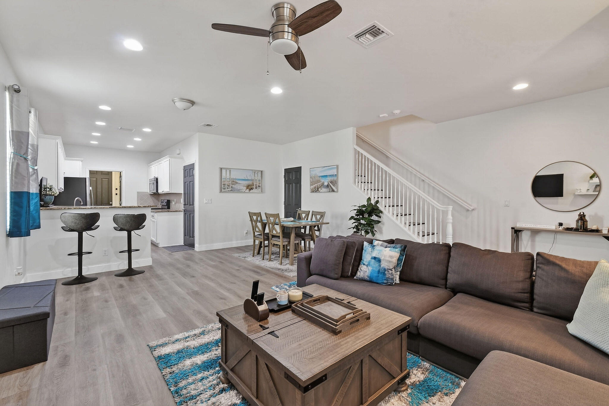 3241 Hemingway Drive Jupiter, FL 33458 - Photo 8 of 39 a living room with furniture and kitchen view