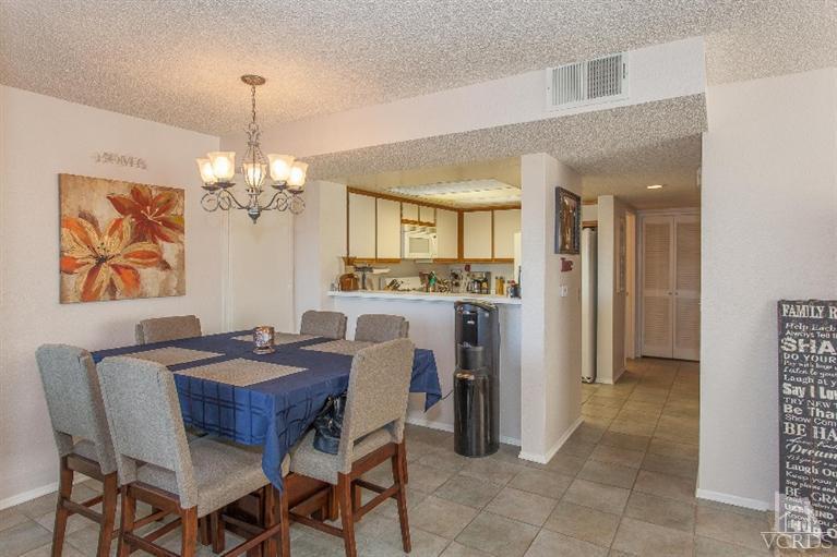 1235 Fitzgerald Road, Unit C Simi Valley, CA 93065 - Photo 8 of 28 a view of a dining room with furniture