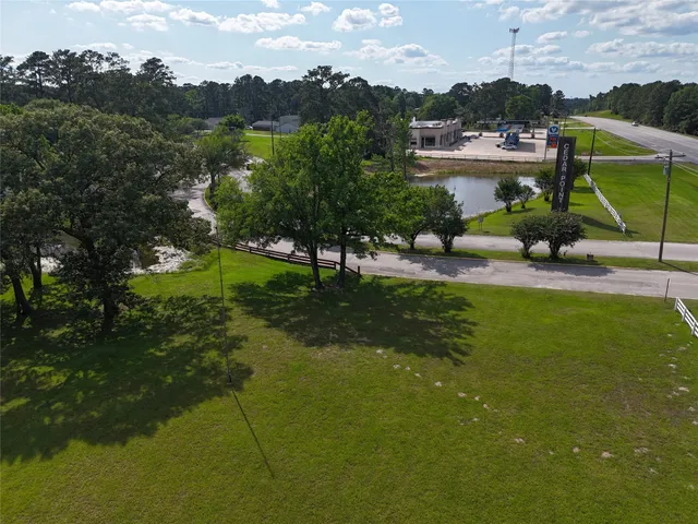 a view of a swimming pool and lounge chair