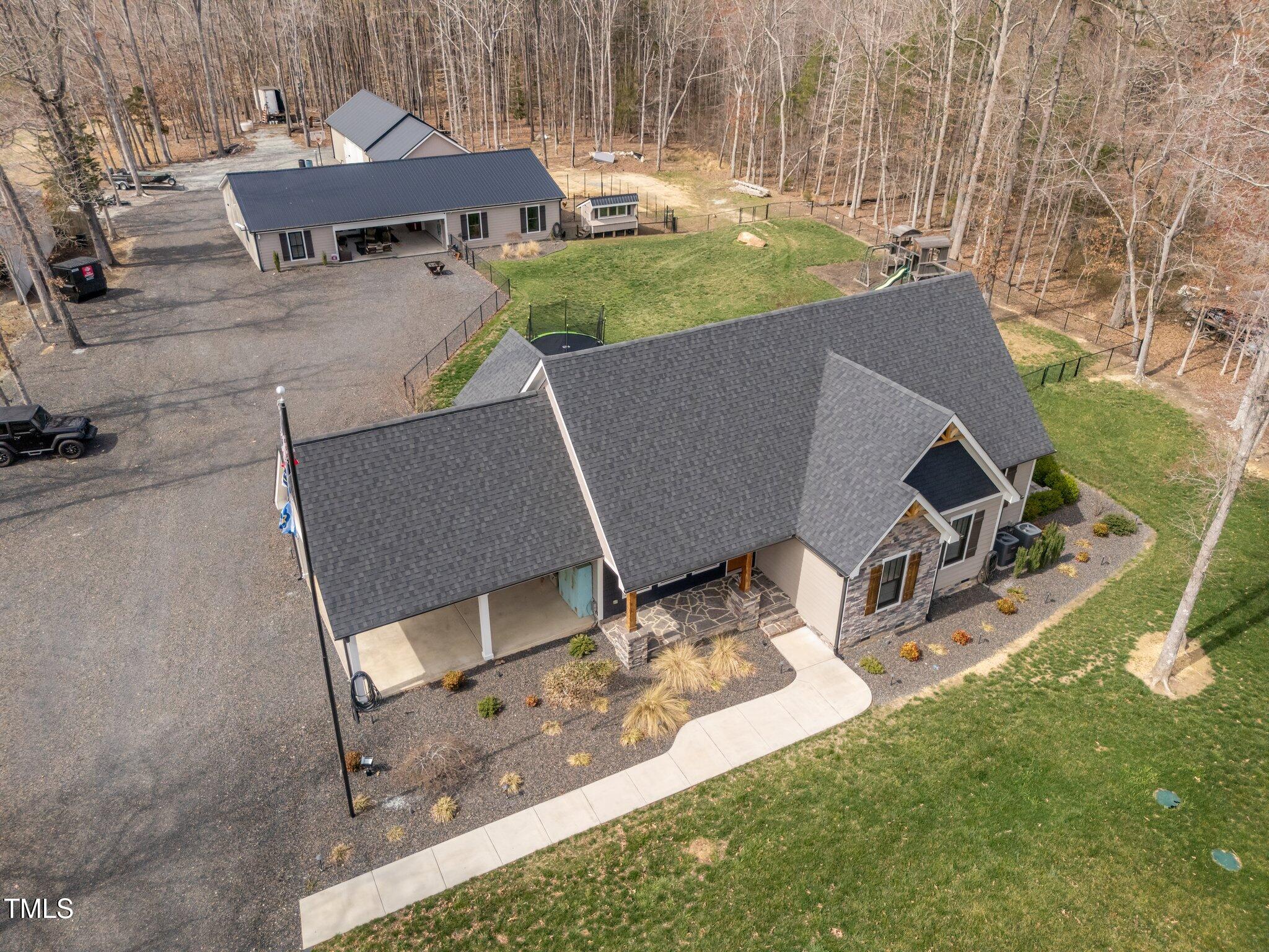 1026 Burlington Road Roxboro, NC 27573 - Photo 8 of 65 8-web-or-mls-DJI_20250319142901_0038_D