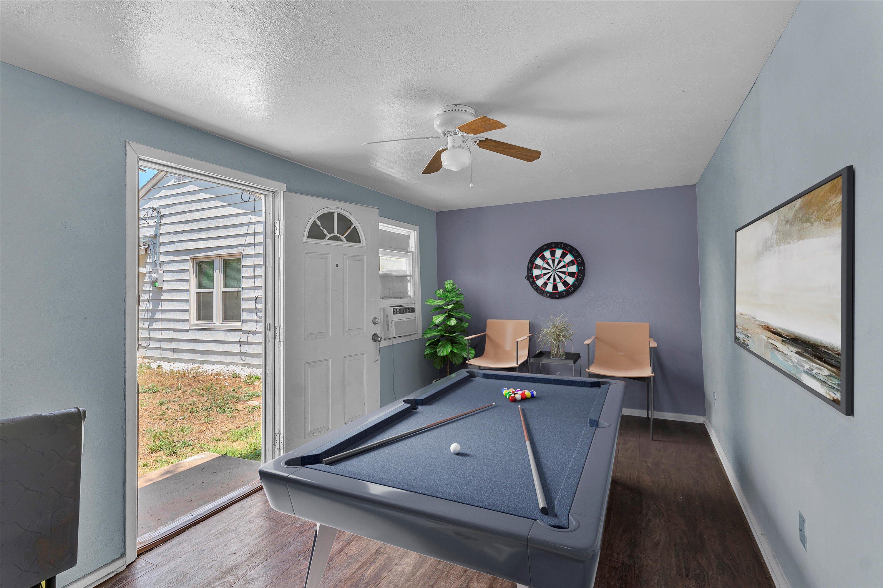 2427 26th Street Lubbock, TX 79411 - Photo 25 of 28 a view of workspace with window and wooden floor