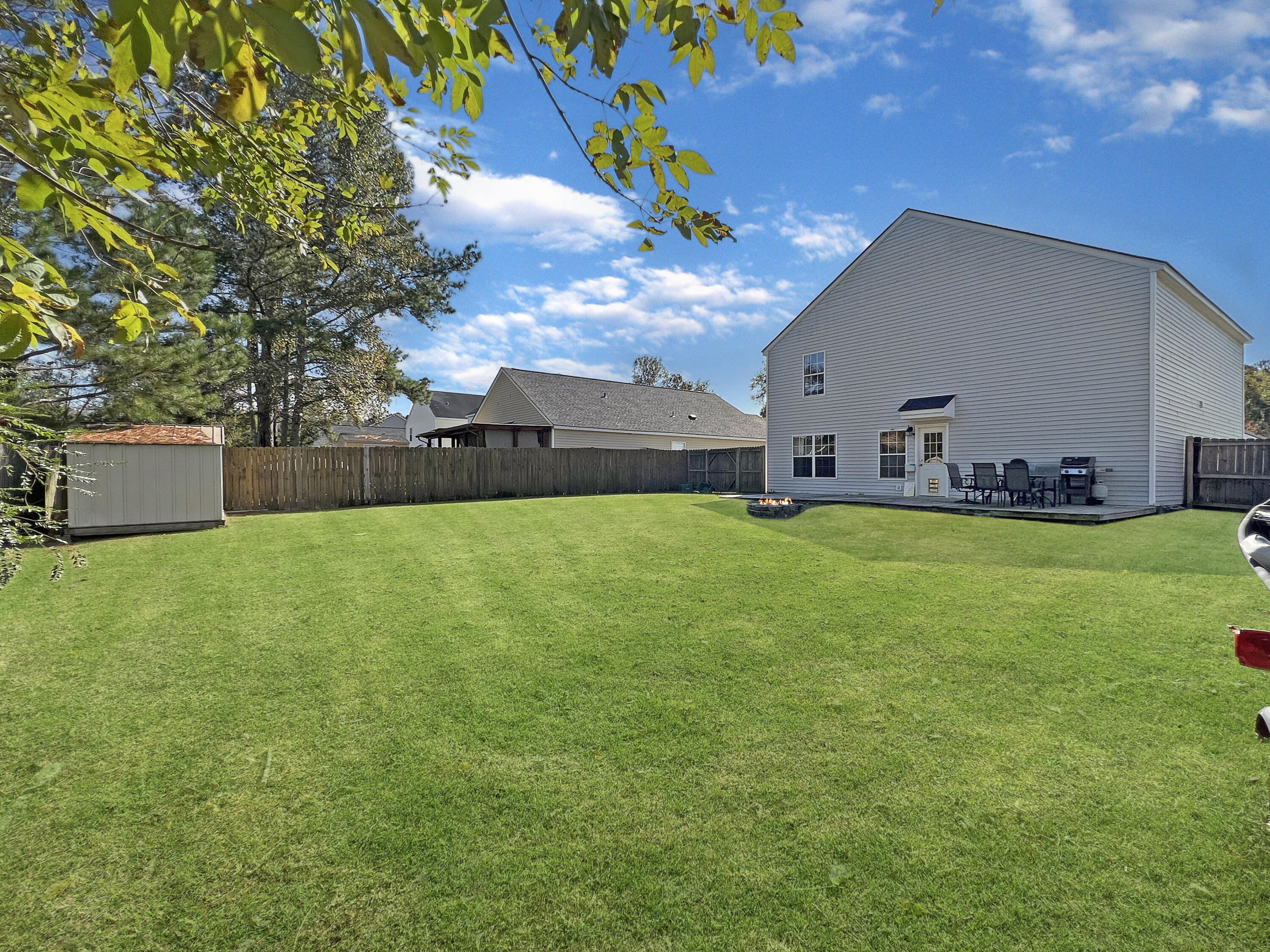 124 Tyron Road Summerville, SC 29483 - Photo 2 of 28 back yard firepit