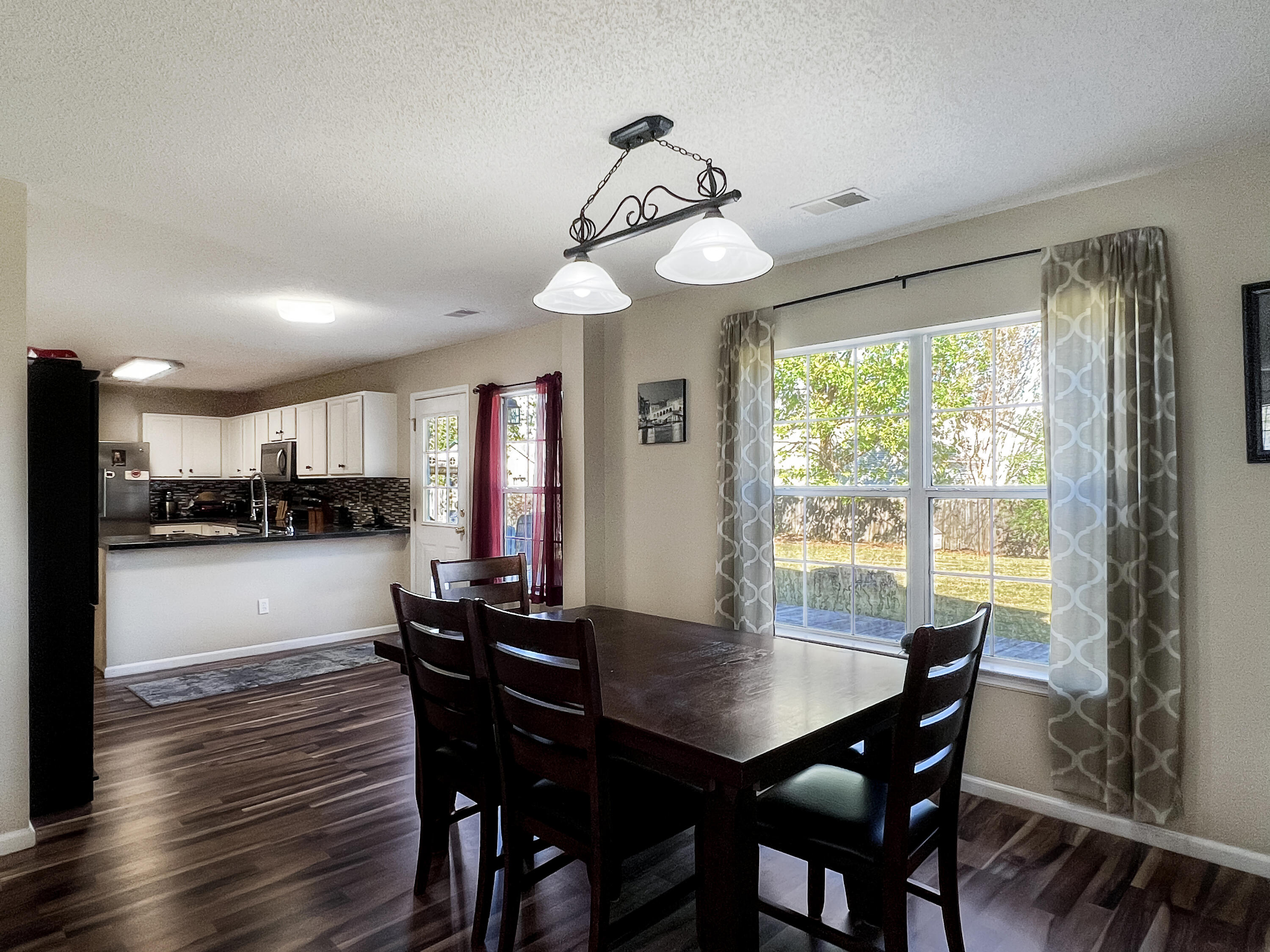 124 Tyron Road Summerville, SC 29483 - Photo 5 of 28 dining room to kitchen