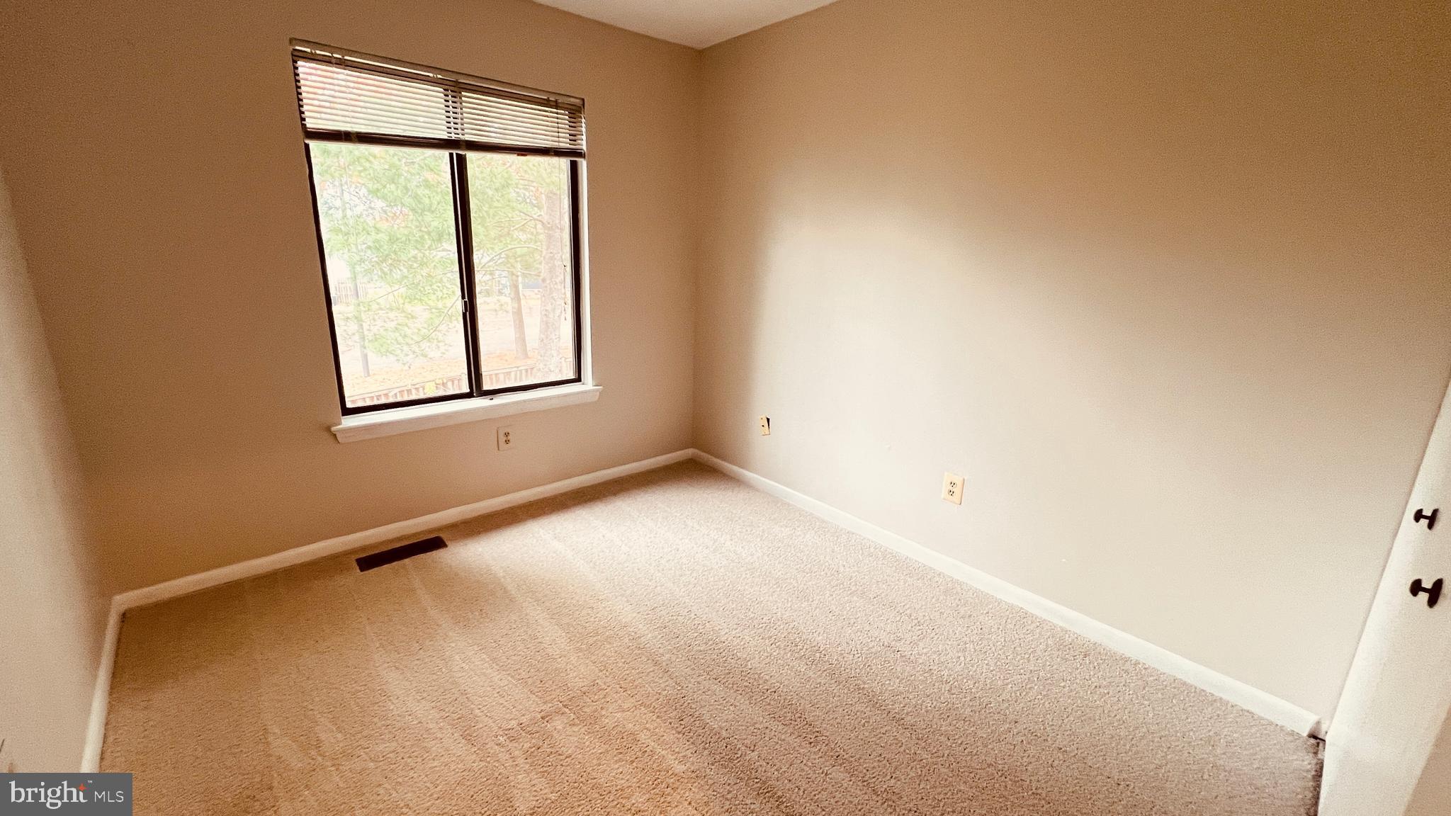 7853 Muirfield Court Potomac, MD 20854 - Photo 12 of 25 an empty room with windows