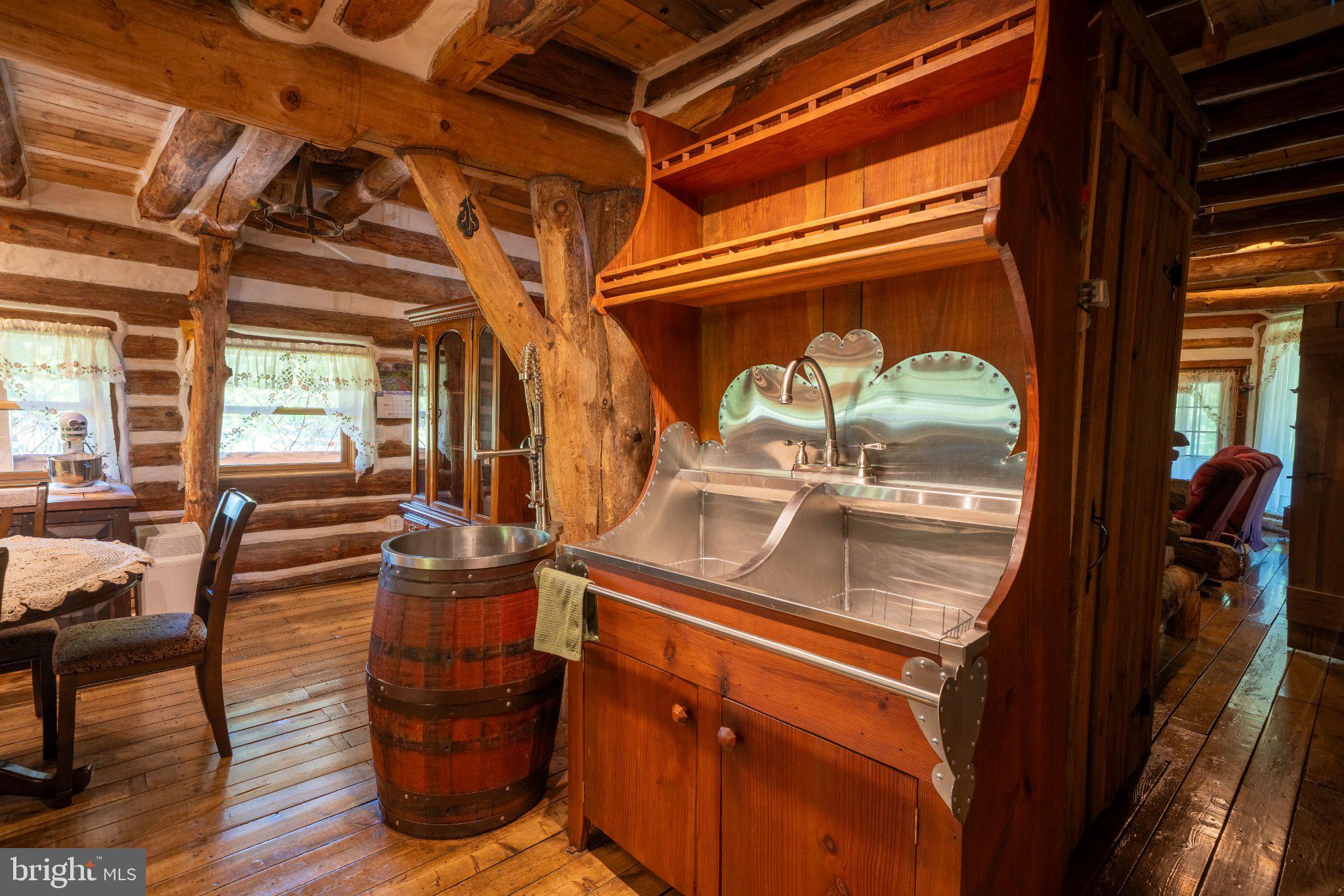 1520 Lingle Valley Road Milroy, PA 17063 - Photo 118 of 144 Rustic charm in a log cabin kitchen.