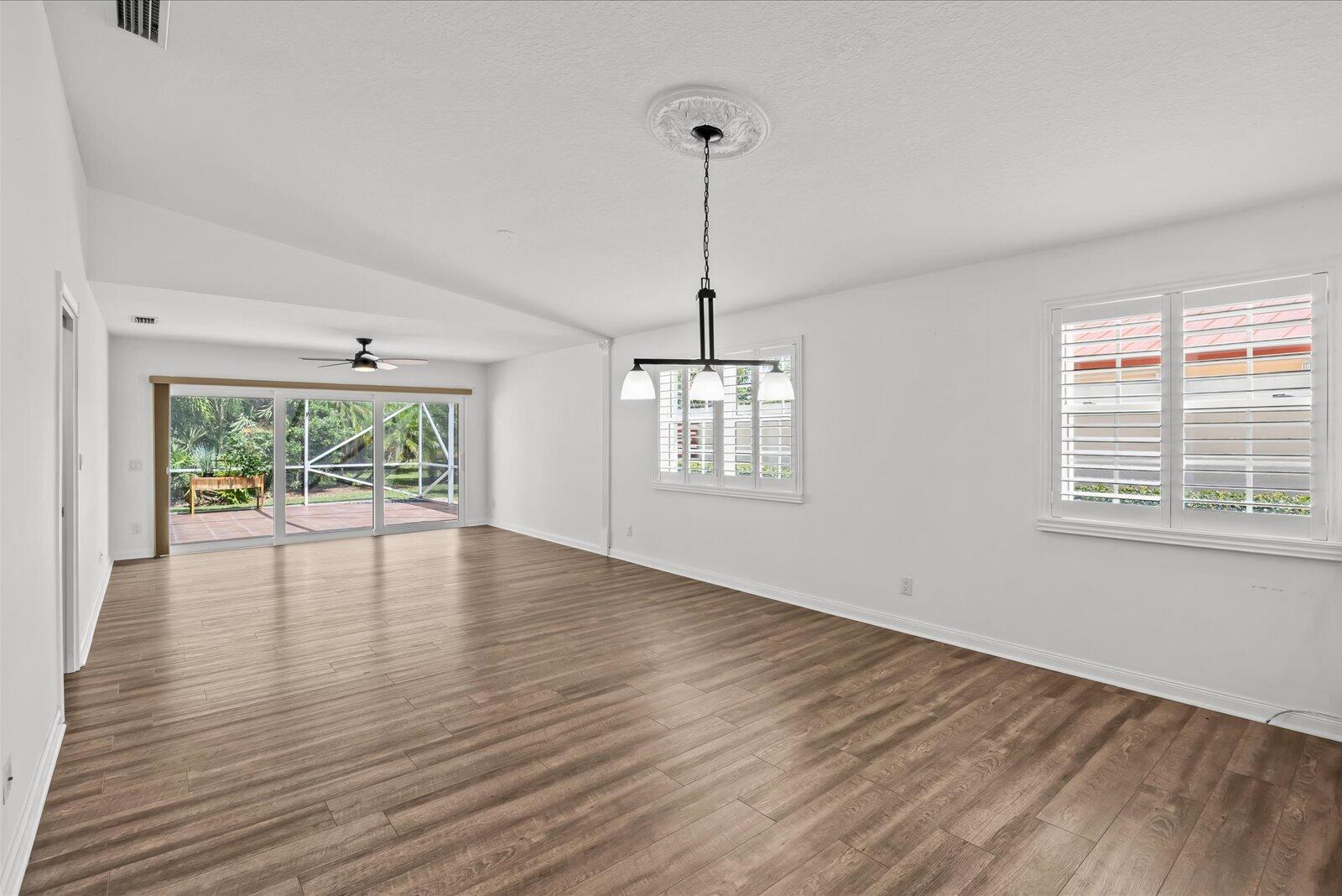 918 Southwest Balmoral Trace Stuart, FL 34997 - Photo 12 of 45 Extended model living area