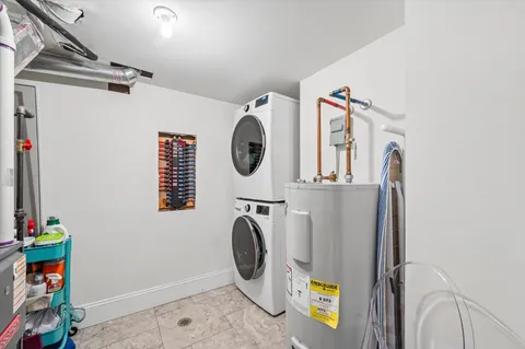 a view of storage and utility room with washer and dryer