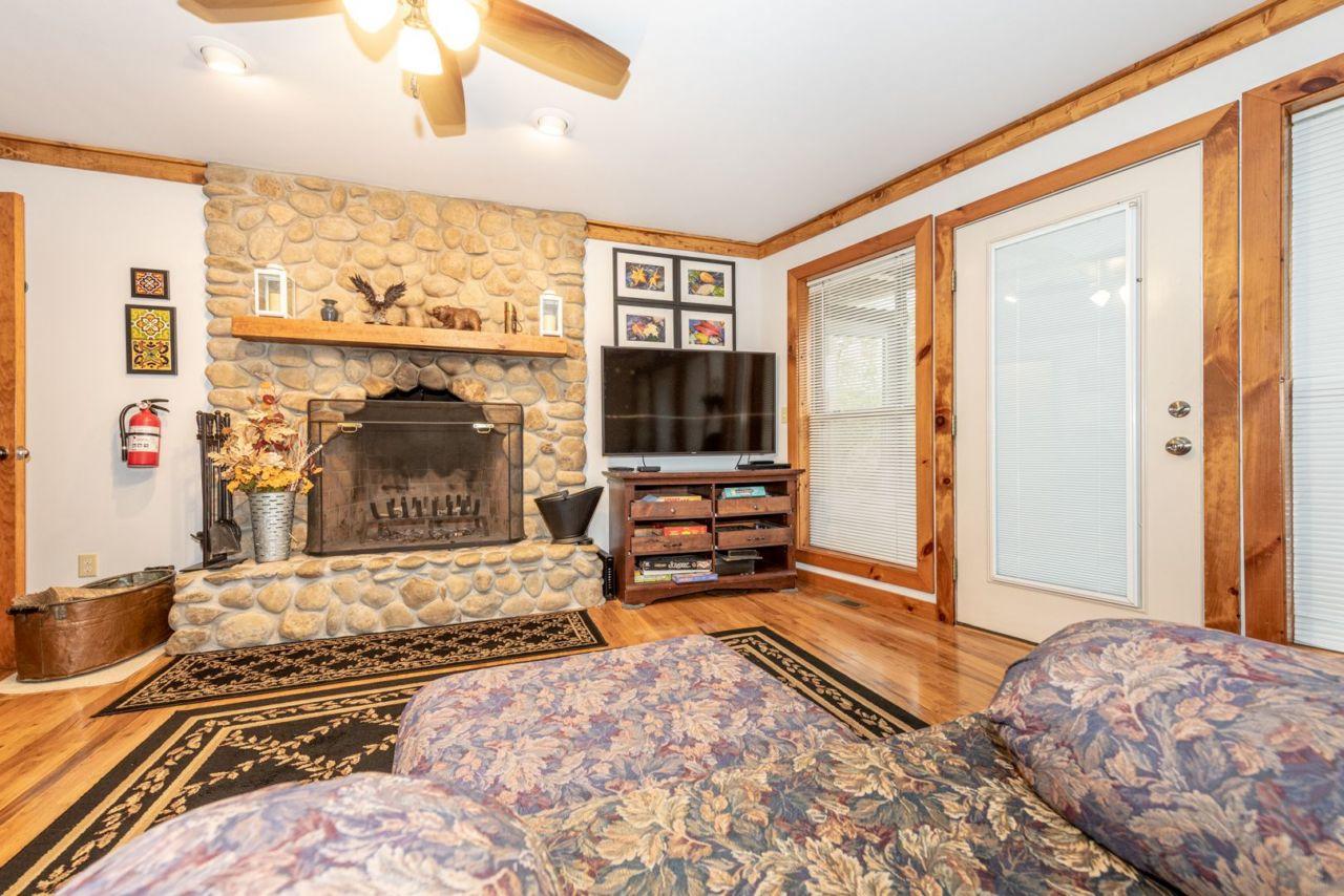 209 Cutter Gap Road Townsend, TN 37882 - Photo 17 of 30 Lower level Fireplace