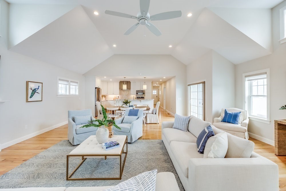 56 Cottage Lane Mashpee, MA 02649 - Photo 17 of 42 a living room with furniture and a large window
