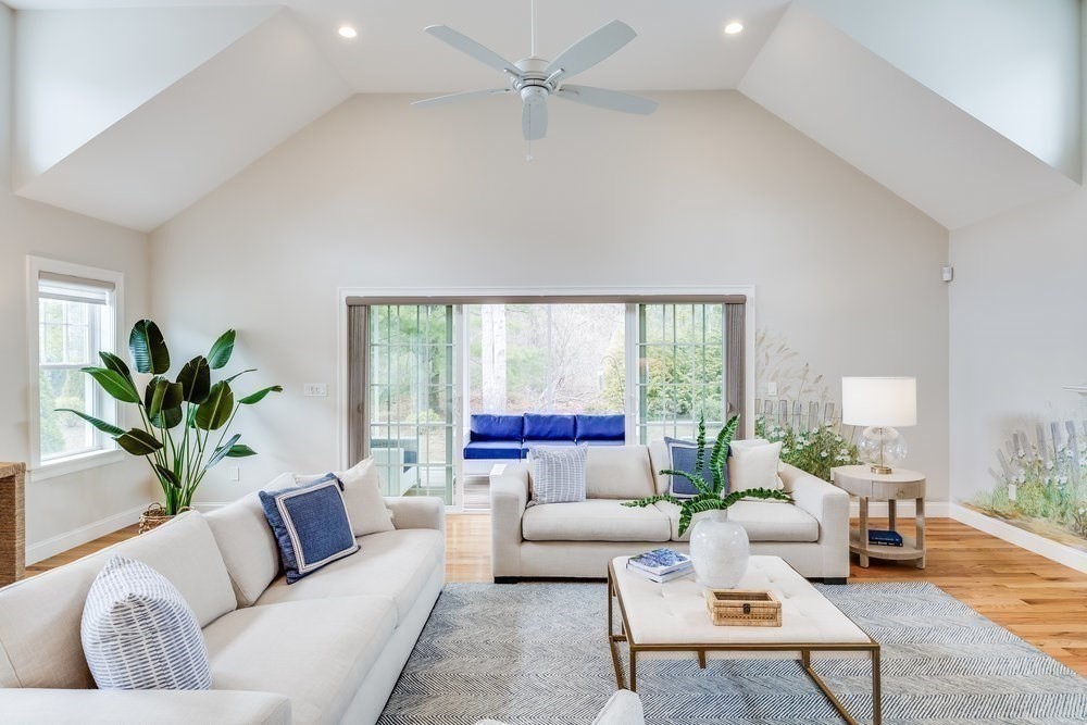 56 Cottage Lane Mashpee, MA 02649 - Photo 18 of 42 a living room with furniture and a large window