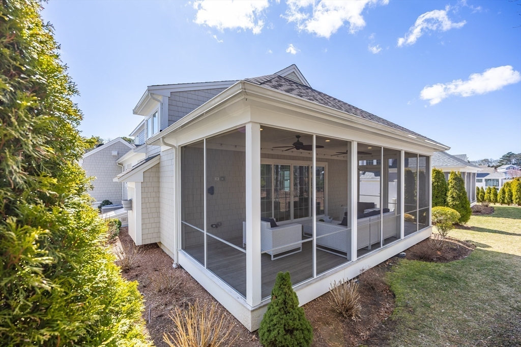 56 Cottage Lane Mashpee, MA 02649 - Photo 30 of 42 a view of a entrance gate of the house