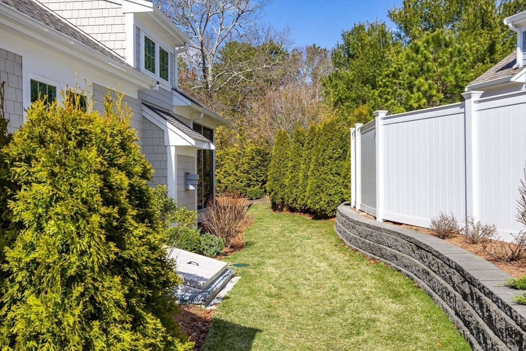 56 Cottage Lane Mashpee, MA 02649 - Photo 35 of 42 a backyard of a house