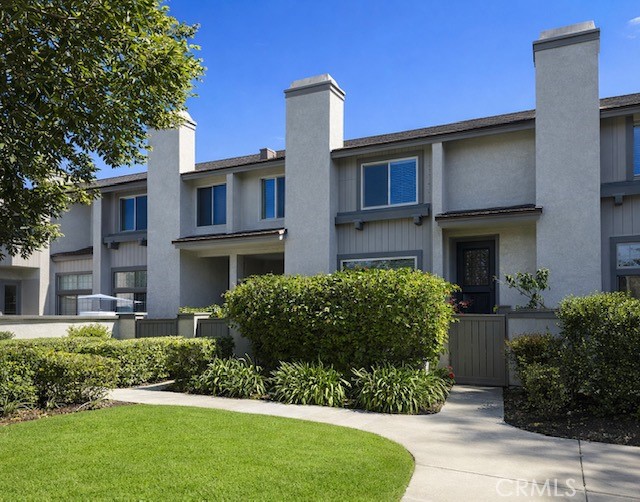 8 Summer Breeze Irvine, CA 92603 - Photo 1 of 1 a front view of a house with a yard