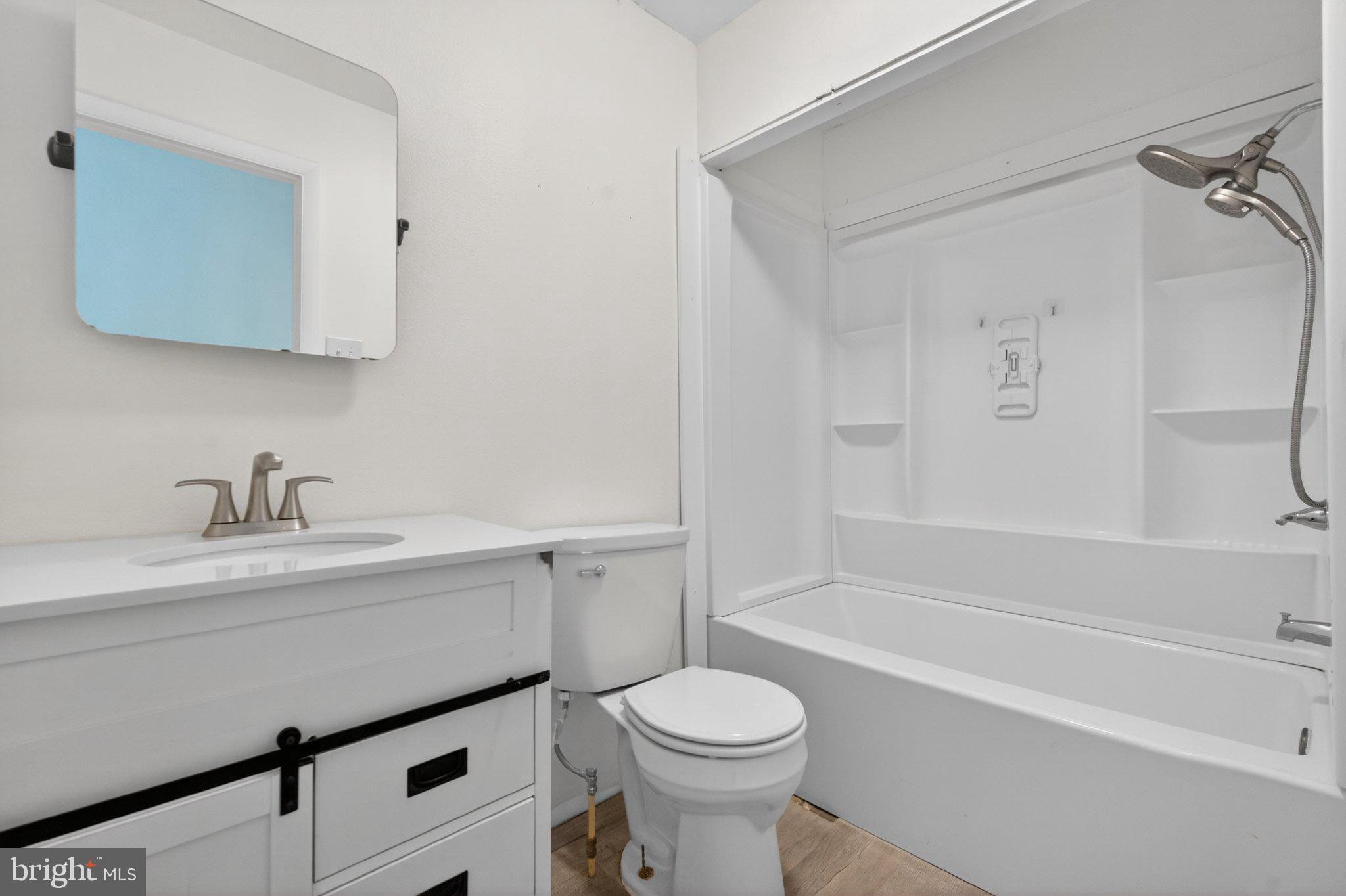 45278 Cove Manor Road California, MD 20619 - Photo 16 of 26 Modern bathroom with sleek finishes.