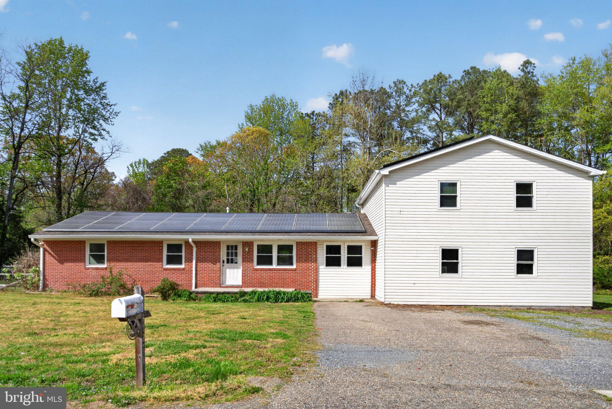 45278 Cove Manor Road California, MD 20619 - Photo 2 of 26 Charming home with modern solar panels.
