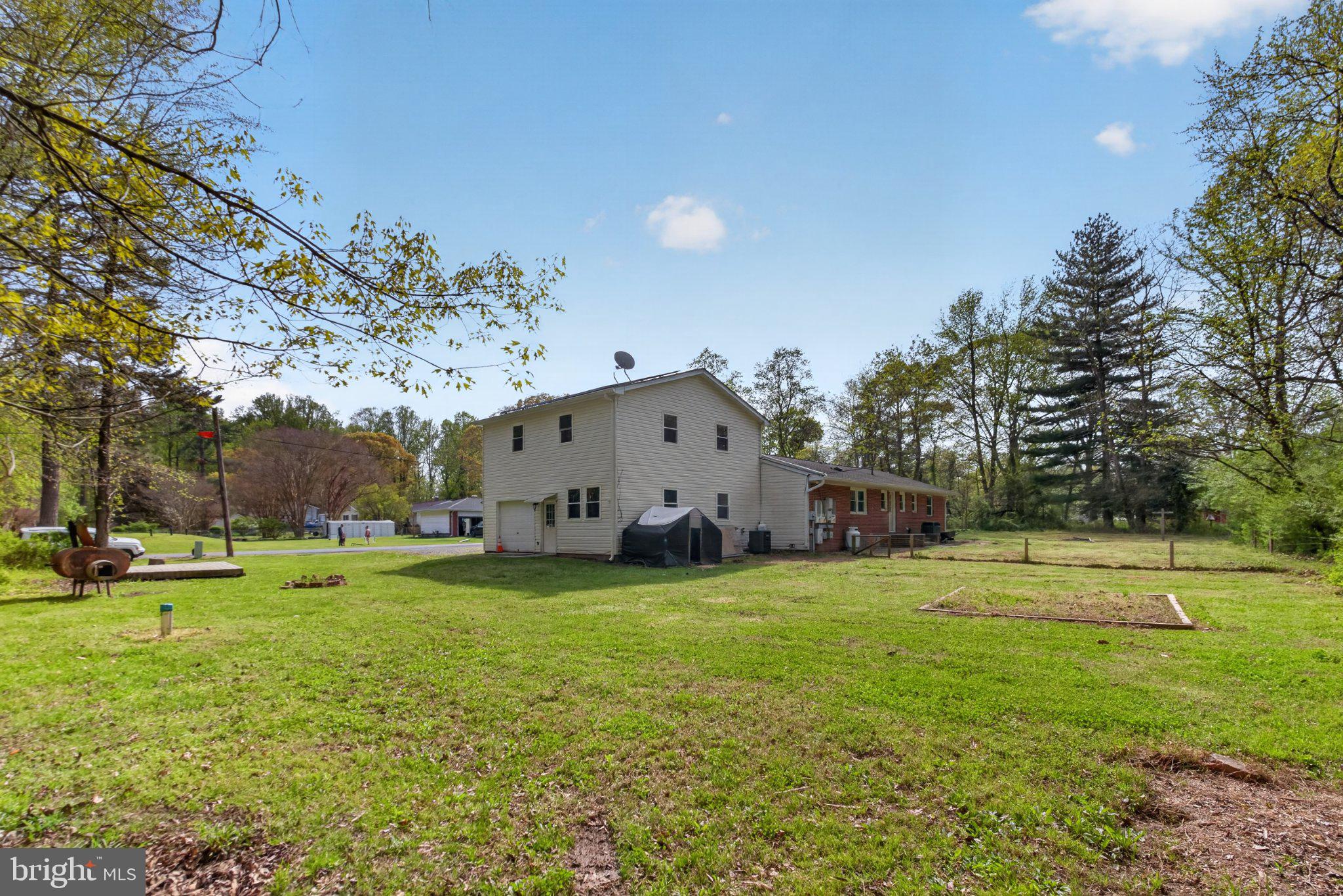 45278 Cove Manor Road California, MD 20619 - Photo 6 of 26 Spacious home on lush green grounds.