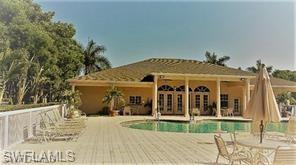 27103 Matheson Avenue, Unit 103 Bonita Springs, FL 34135 - Photo 23 of 29 View of swimming pool featuring a patio