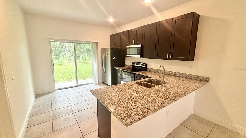 13664 Southwest 61st Circle, Unit 1 Ocala, FL 34473 - Photo 11 of 44