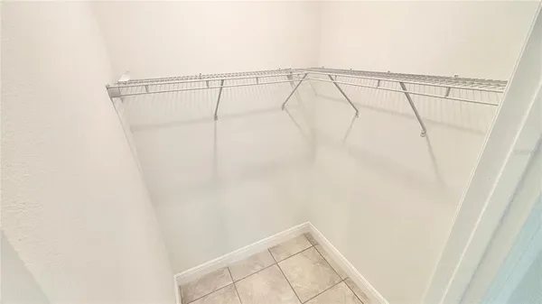 a bathroom with a granite countertop shower