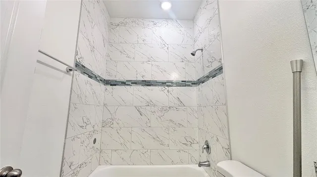a bathroom with a bathtub