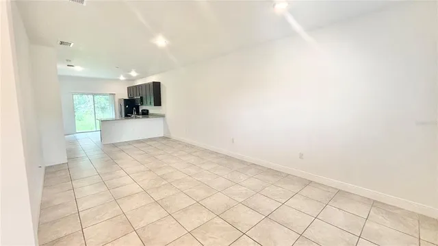 a view of a kitchen with a sink