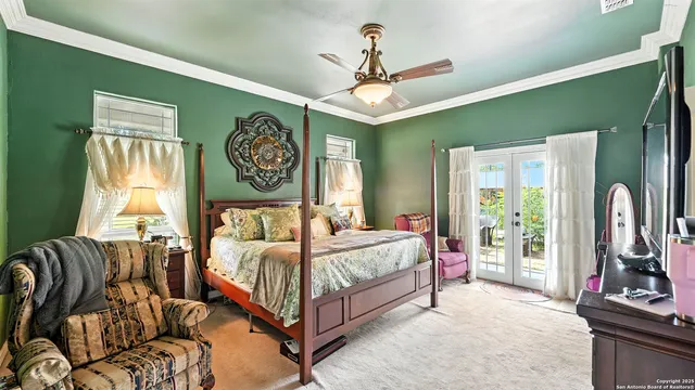 a kitchen with a sink a counter and cabinets