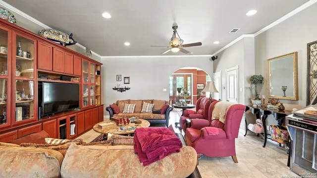 a bathroom with a sink vanity mirror and toilet