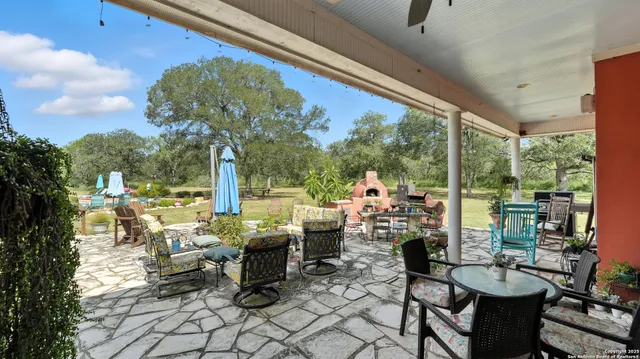 a view of a kitchen with a sink and garden
