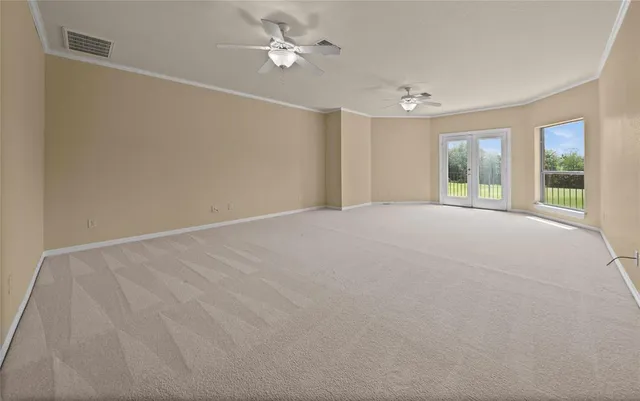 a bathroom with a tub and a window