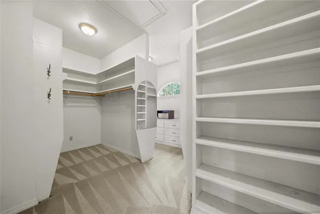 en view of an empty room with a window