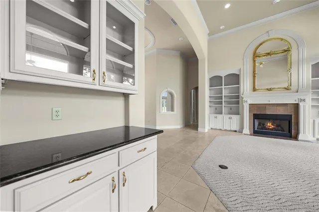 en view of an entryway with a chandelier