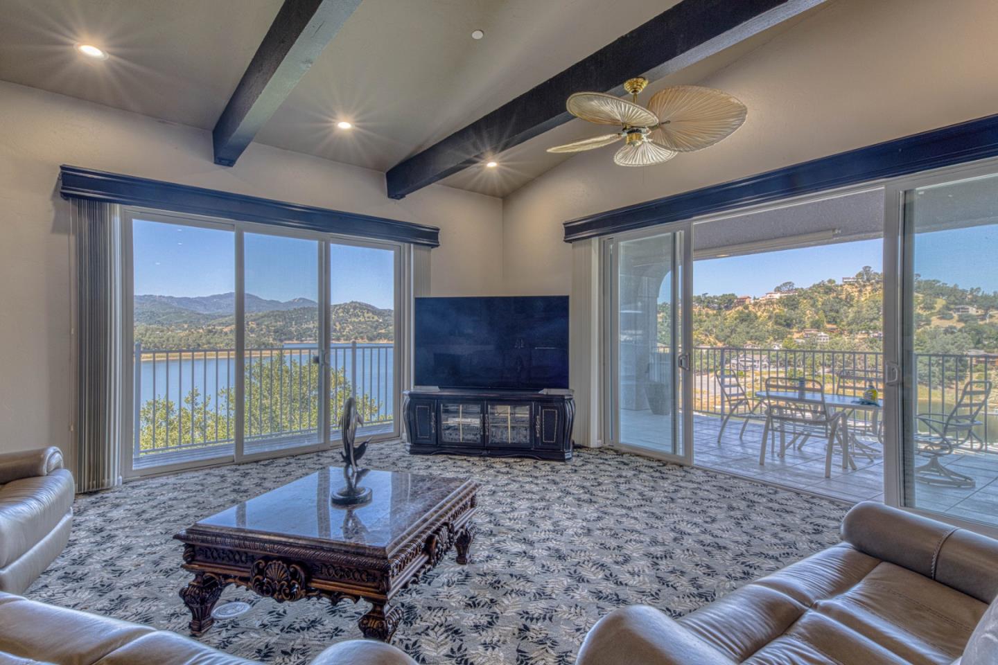 8213 Bass Point Road Bradley, CA 93426 - Photo 16 of 58 a living room with furniture and a flat screen tv