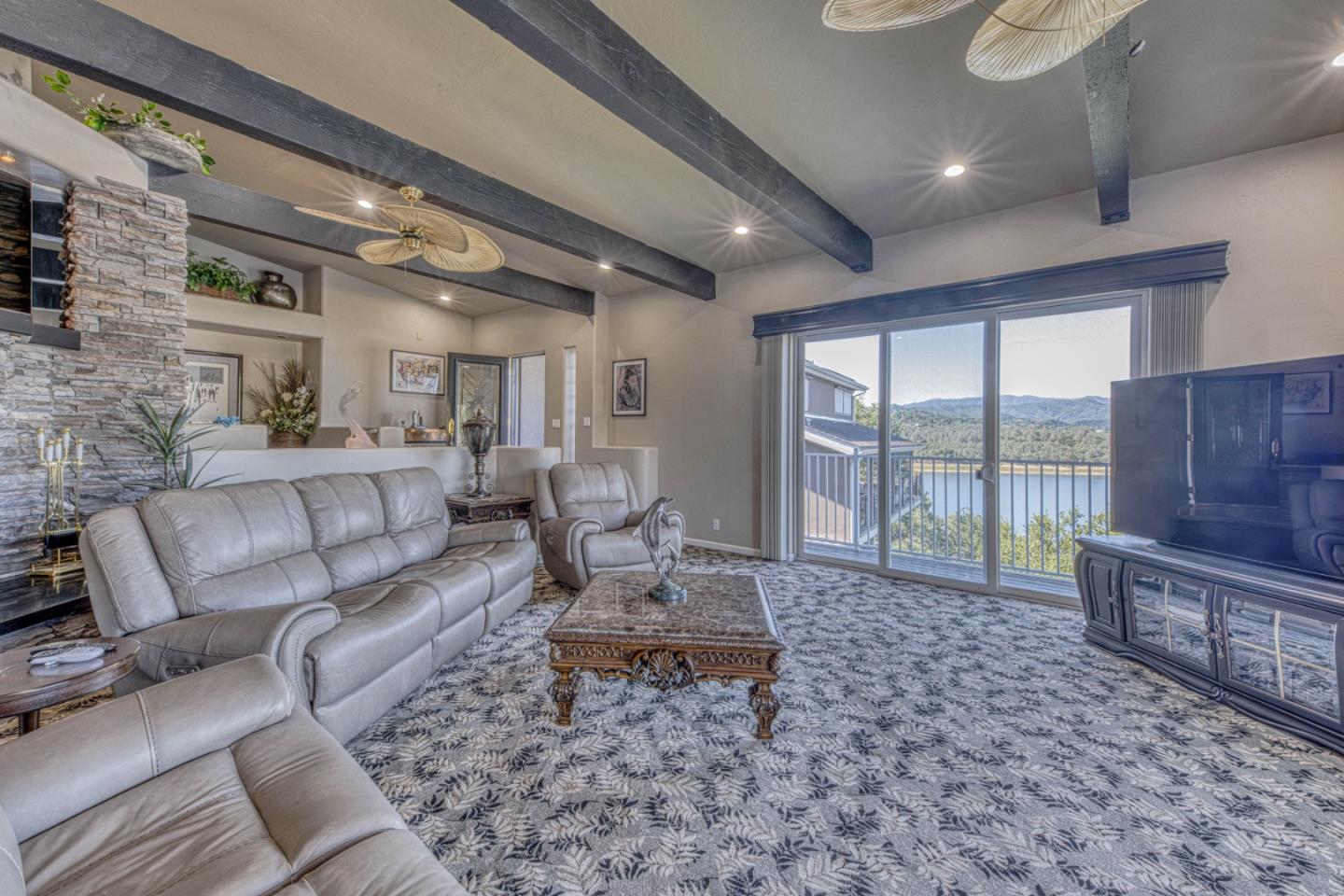 8213 Bass Point Road Bradley, CA 93426 - Photo 17 of 58 a living room with furniture and a flat screen tv