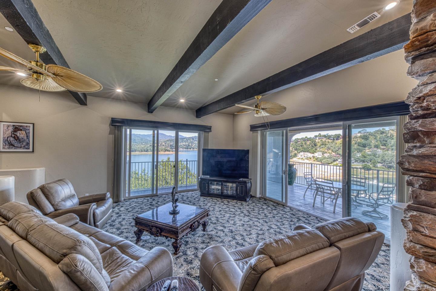 8213 Bass Point Road Bradley, CA 93426 - Photo 18 of 58 a living room with furniture and a large window