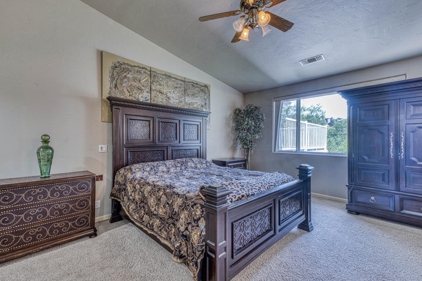 8213 Bass Point Road Bradley, CA 93426 - Photo 25 of 58 a bed room with a bed and a dresser